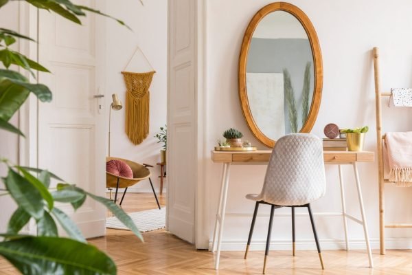 stylish-and-minimalist-interior-of-living-room-with-design-gold-armchair--e1697621230921.jpg